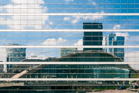 Paris, France - May 3, 2011  La Defense district  Reflection of  La Defense  district in the glass surface  La Defense is a major business district near Paris, in France のeditorial素材