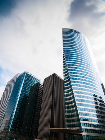 Paris, France - May 3, 2011  La Defense district Three skyscrapers against the cloudy sky  La Defense is a major business district near Paris, in France のeditorial素材