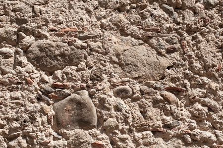 Grunge texture with cement and stones  Wall surface of old building の写真素材