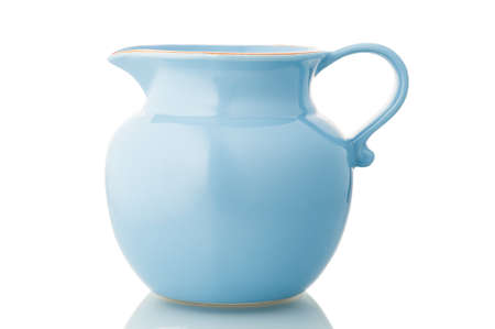 Blue ceramic pitcher isolated on white.の写真素材