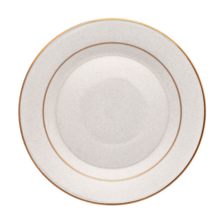 Empty dinner plate with golden rim from above isolated on white.の写真素材