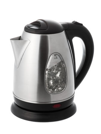 Stainless steel electric kettle with boiling water Isolated on white background の写真素材