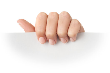 Paper card in woman hand isolated on white background with  white vignette.
の写真素材