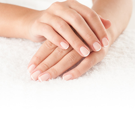 Beautiful hands on the white towel with copy space.の写真素材