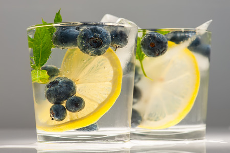 Summer lemonade with blueberries, lemon and mint.の写真素材