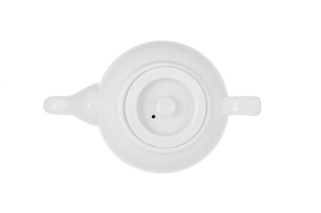 Top view of a white porcelain teapot isolated on a white background.の写真素材