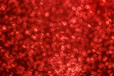 Red background with shimmering glitter - Defocused lights.