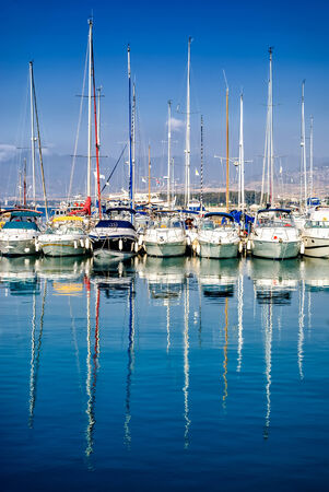 Reflection of boats with masts in port near Polis city, Cyprus.の写真素材
