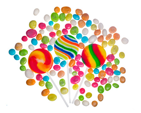 Mixed colorful candies isolated on whiteの写真素材
