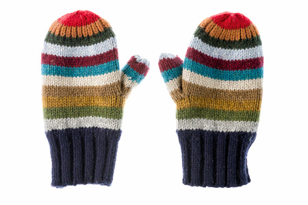 Pair of varicolored striped mittens isolate on white.の写真素材