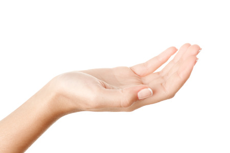 Open palm holding something invisible against pure white background.の写真素材