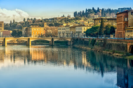 Florence or Firenze city view on Arno river, evening landscape with reflection. Tuscany, Italy.の写真素材