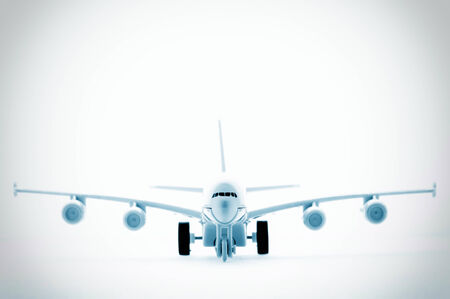A close up shot of a die cast model plane selective DOF, abstract background, blue toning.の写真素材