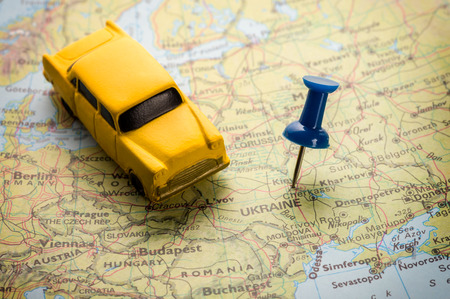 Map of Europe with a red push pin placed on the city of Kyiv.の写真素材