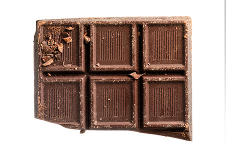 Rough part of dark chocolate bar with crumbs.の写真素材