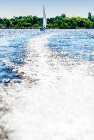 Sailing yacht with water trace, copy space.の写真素材