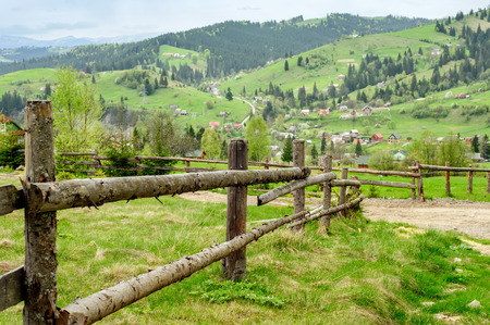 Natural fence on the background of a mountain landscape.の写真素材