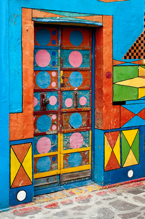 Door of Casa deo Bepi Sua, the most multicoloured house in Burano, a community in the Venetian Lagoon.のeditorial素材
