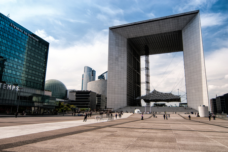 PARIS, FRANCE - MAY 3, 2011: La Defense district with La Grande Arche (La Grande Arche de La Defense ) and modern buildings in Paris, France. La Defense is is a major business district in Paris.のeditorial素材