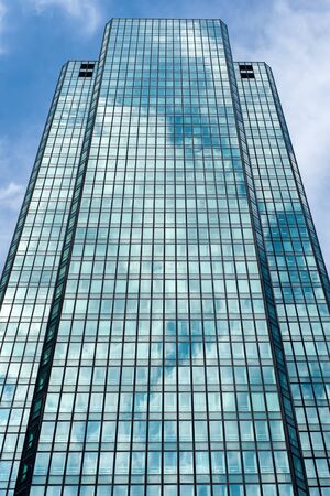 Business skyscraper background. La Defense financial district in Paris, France. Futuristic corporate office building. Business abstract background.の写真素材