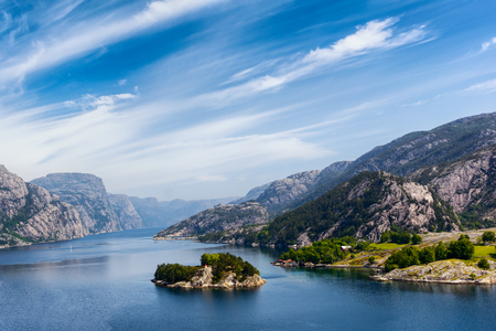 Beautiful Norway natural landscape with mountains clear water and cloudy sky, Stavanger, Norwayの写真素材