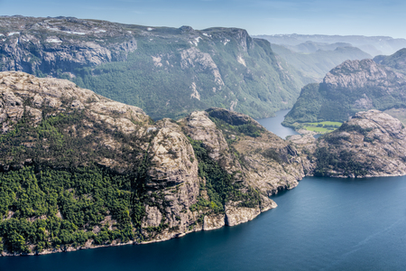 View of the Lysefjorden fjord. Made from the Preikestolen (Pulpit Rock) in Southern Norway on a sunny day.の写真素材