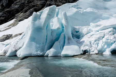 Blue ice cave of Tuftebreen - glacier in Norway is nearby to Steinmannen and Bakli.の写真素材