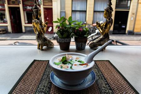 Thai chicken and coconut milk soup- Tom Ka Gai.の写真素材