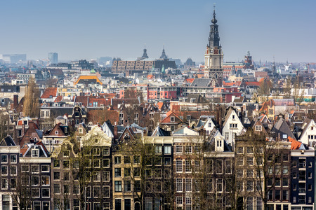 AMSTERDAM, NETHERLANDS - APRIL 10, 2018: Amsterdam skyline cityscape from the Oosterdok in the Netherlands. The Oosterdok is a chanel in Amsterdam .の写真素材