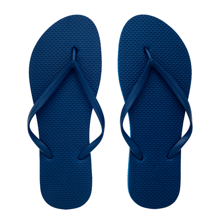 Blue rubber flip-flops isolated over white background, pair of thongs, shot above.の写真素材