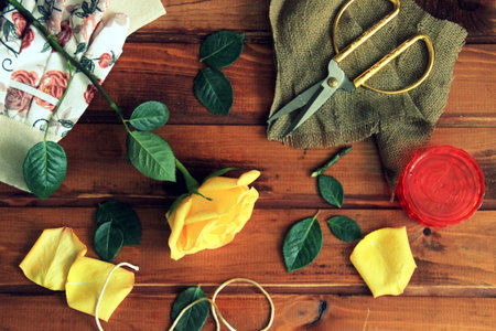 Rose on a wooden table. still lifeの写真素材