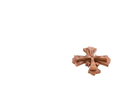 wooden brown cross on the white backgroundの写真素材