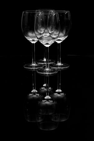 empty transparently wineglasses on the black backgroundの写真素材