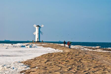 windmill on the seashore  の写真素材