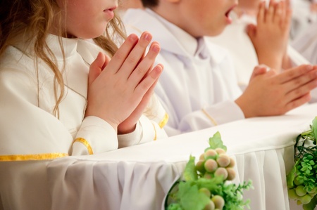 children accepting the first Holy Communion の写真素材