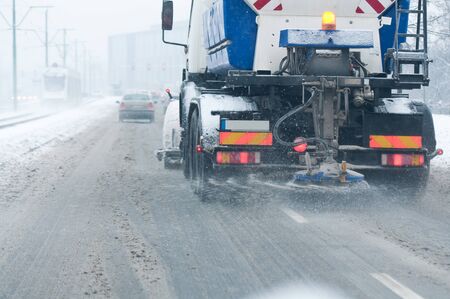 snowblower in the street during the winterの写真素材
