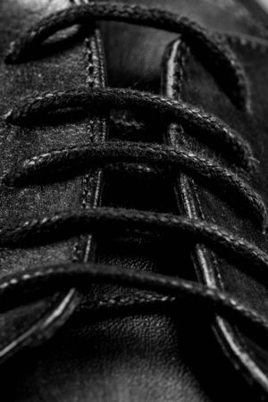 Closeup view of boot with black lacesの写真素材