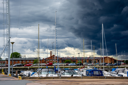 yacht or motor boat at harbor moored at Karlskrona in Swedenのeditorial素材