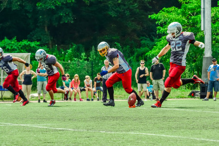 american football players in action