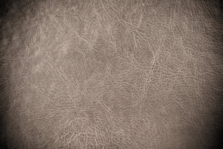 grunge scratched leather to use as backgroundの写真素材