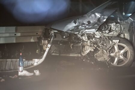 crshed car in accident by nightの写真素材