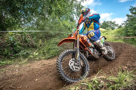Motocross rider on the raceのeditorial素材