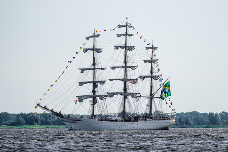 Trzebiez, Poland - August 08, 2017 - Sailing ship Cisne Branco sails to the full sea after final of Tall Ships Races 2017 in Stettin on 05-08 August, Polandのeditorial素材