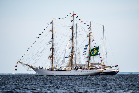 Trzebiez, Poland - August 08, 2017 - Sailing ship Cisne Branco sails to the sea after the final of Tall Ships Races 2017 in Stettin on 05-08 August, Polandのeditorial素材