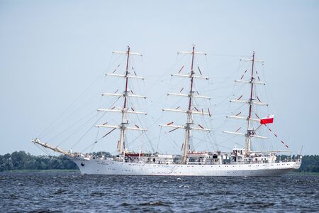 Trzebiez, Poland - August 08, 2017 - Sailing ship Dar Mlodziezy sails to the full sea after final of Tall Ships Races 2017 in Stettin on 05-08 August, Polandのeditorial素材