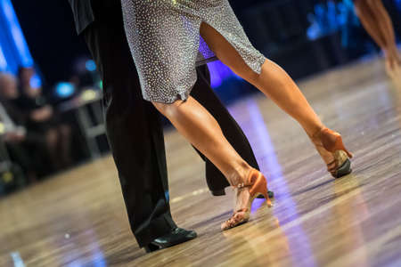 couple dancing latin dance on the dancefloorの写真素材