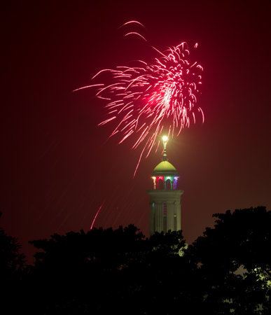 Beautiful fireworks in the sky behind mosque minaret.this photo was taken from Chittagong,Bangladesh.の写真素材