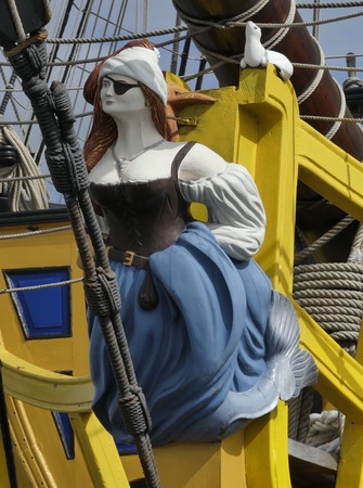 Saint-Malo, France March 28, 2017: Figurehead under the bowsprit of the historical replica corsair frigate" Etoile du Roy "docked in the harbor of Saint-Malo, France.のeditorial素材