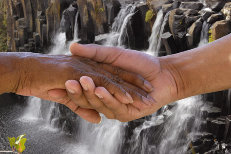 Making peace at the waterfallの写真素材
