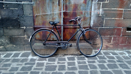 Old bicycle, old building